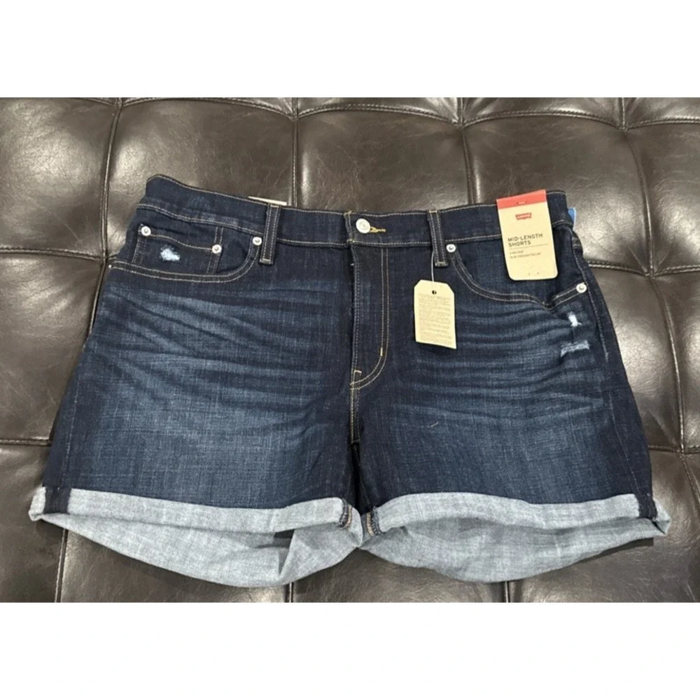 Levi's Women Size 33 Mid Length Blue Denim Shorts Cuffed Dark Distressed Stretch